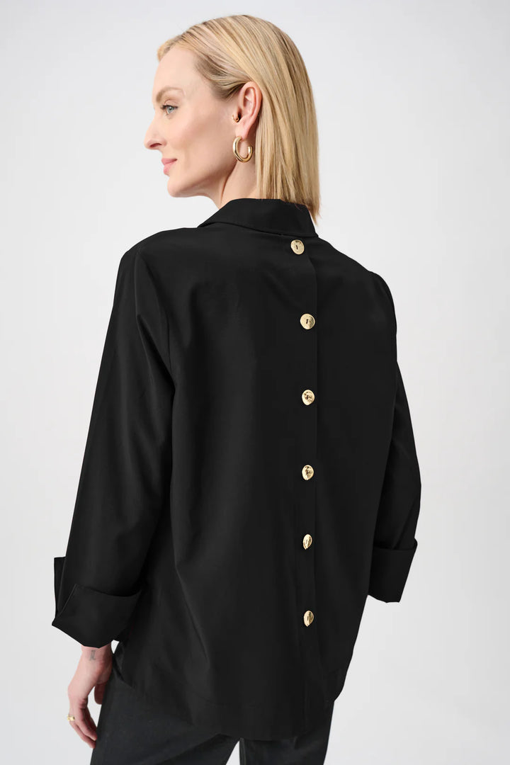 Close-up side view of the black Joseph Ribkoff stretch poplin top highlighting the collar and front placket.