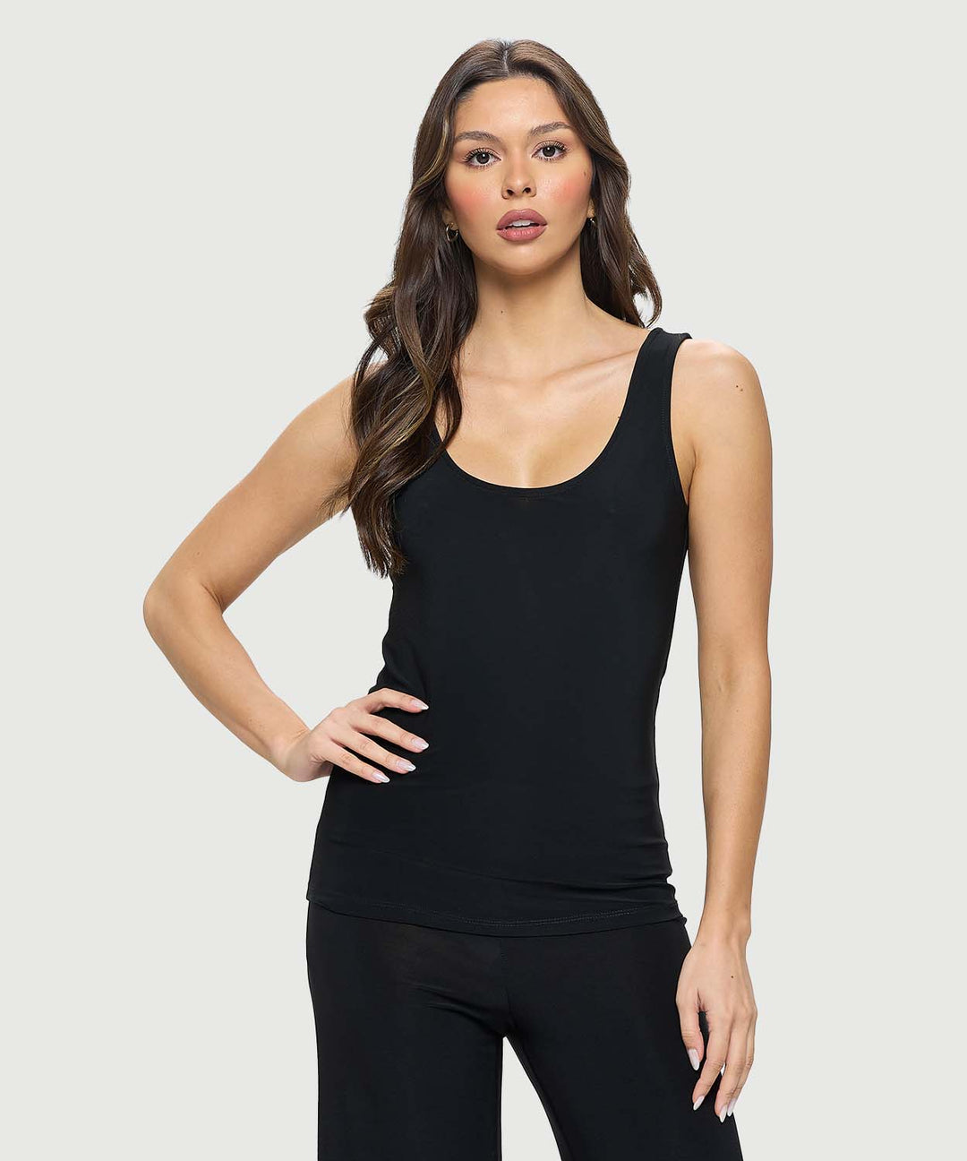 Front view of the black Last Tango basic scoop neck tank top, styled as an elegant sleeveless base layer.