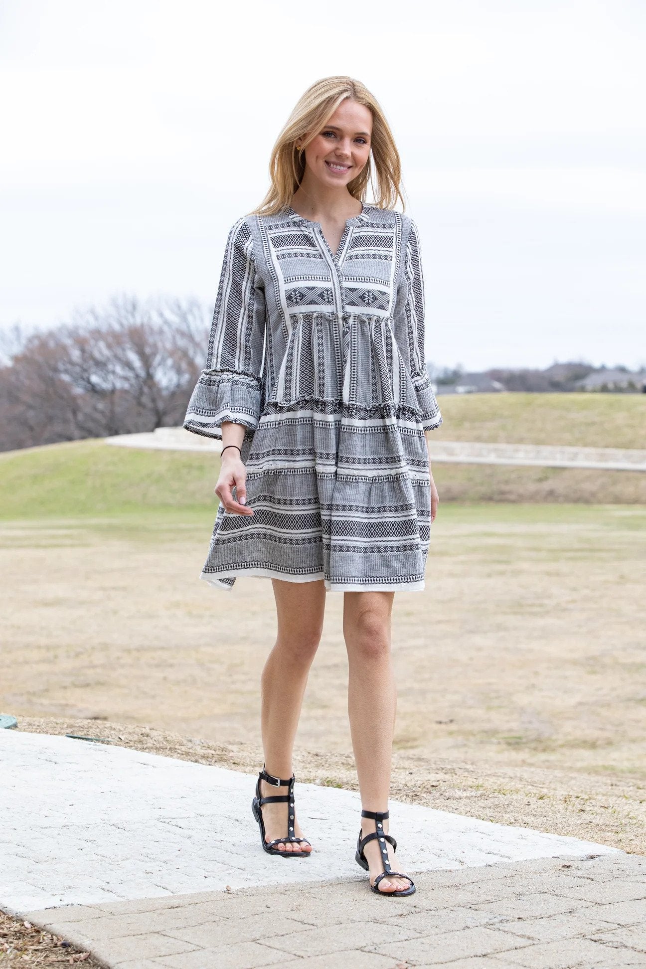 Tiered Tunic Dress With Flounce Sleeves Model WAlking Outdoors.